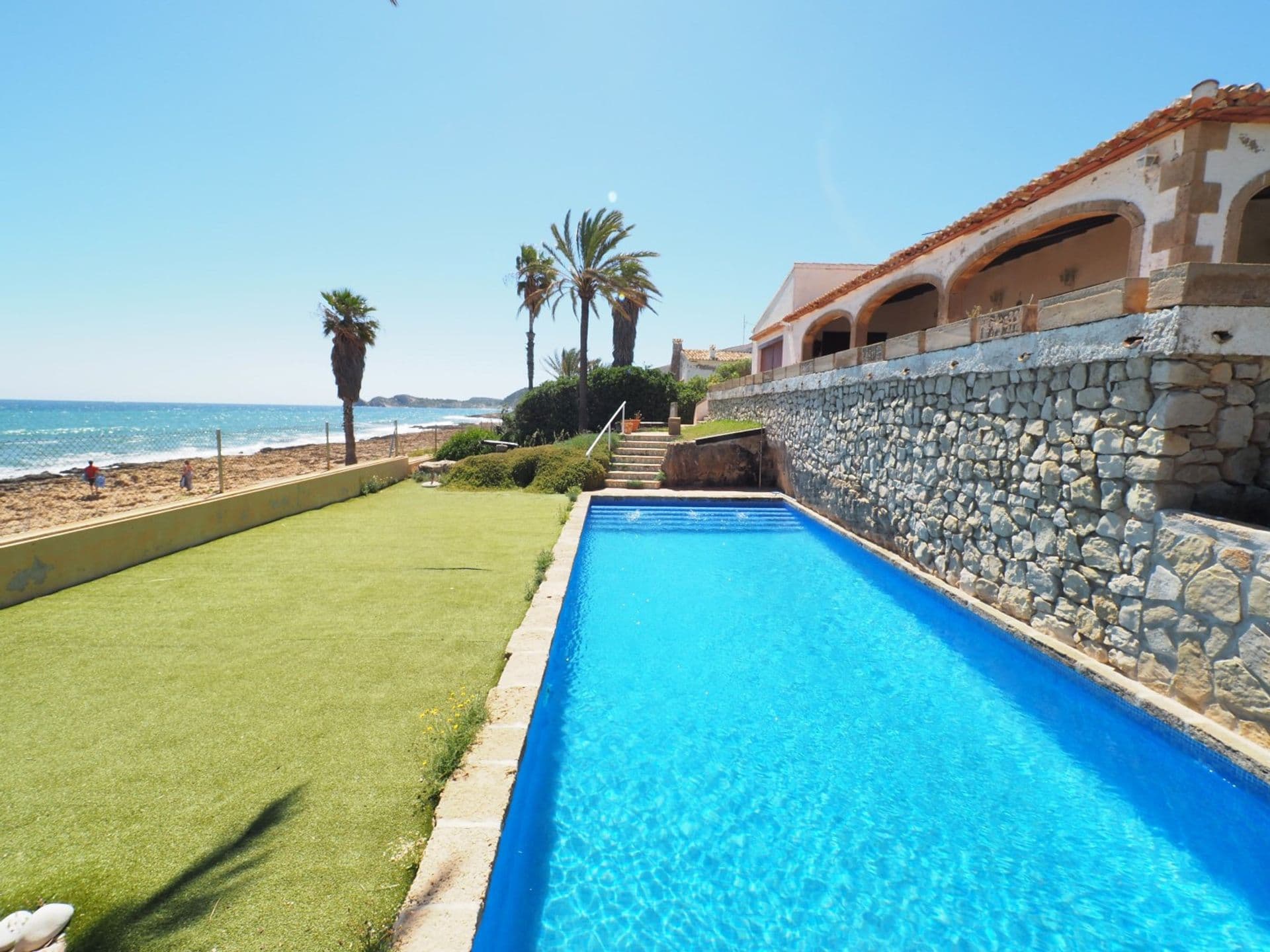 Beachfront villa for sale in the Arenal, Javea.